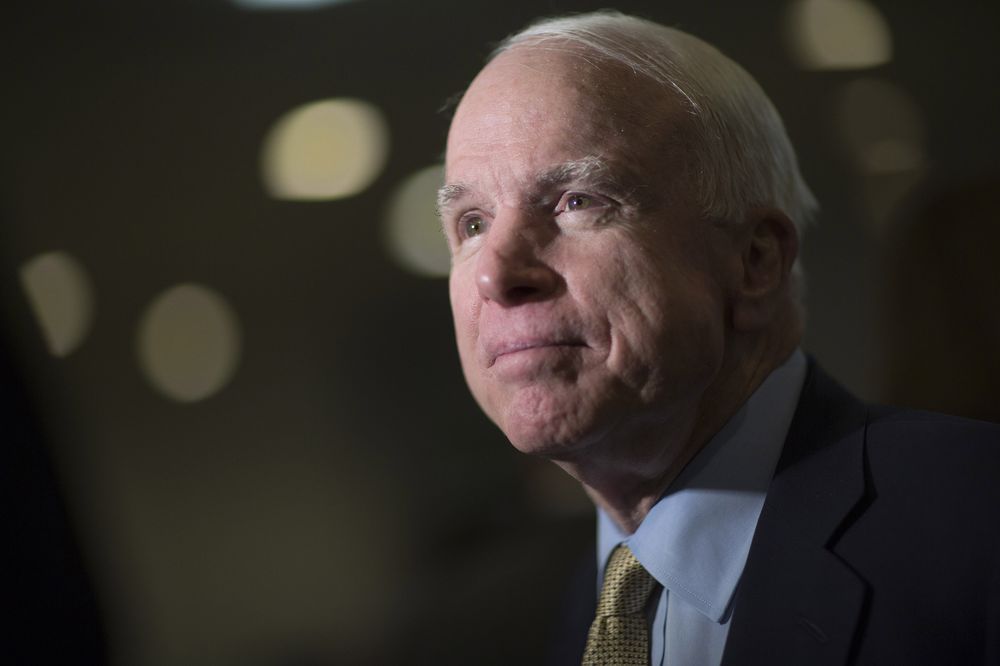 John McCain Photographer: Andrew Harrer/Bloomberg