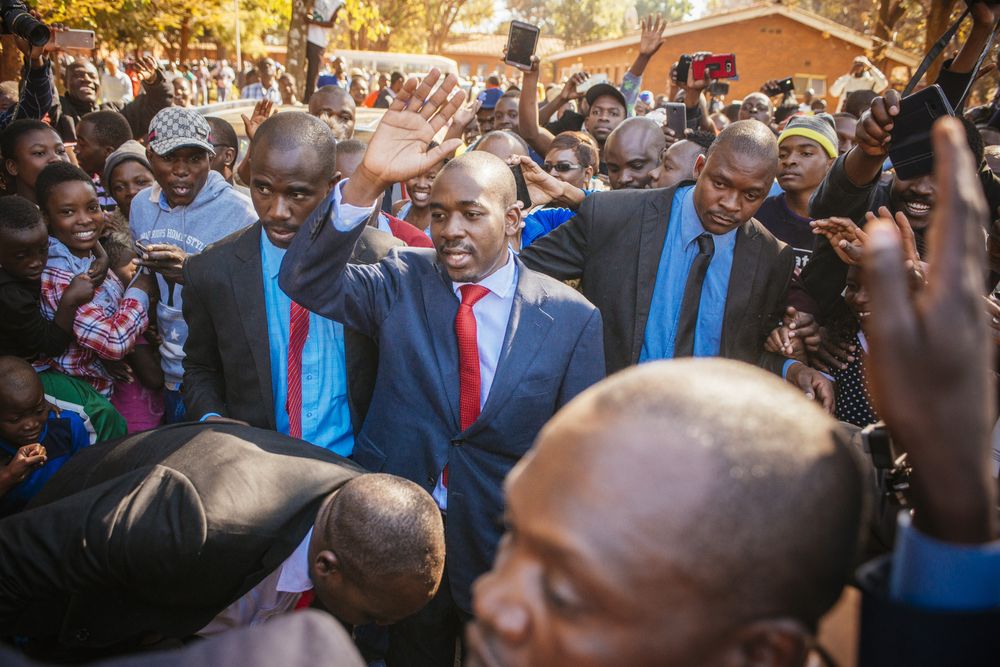 Nelson Chamisa waves to supporters as he arrives to cast his vote on July 30. Photographer: Waldo Swiegers/Bloomberg