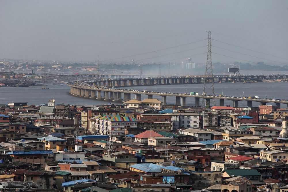 Traffic passes across a bridge from Isale Eko on Lagos Island towards the mainland in Lagos, Nigeria. Photographer: George Osodi/Bloomberg