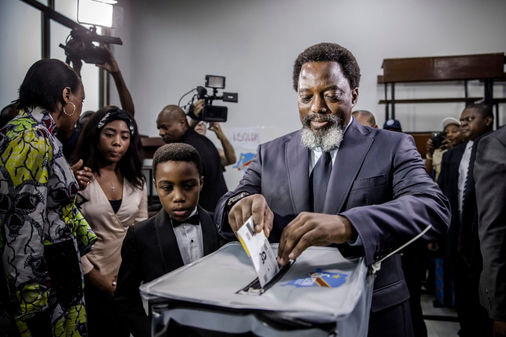 Joseph Kabila casts his vote on Dec. 30 Photographer: Luis Tato/AFP via Getty Images