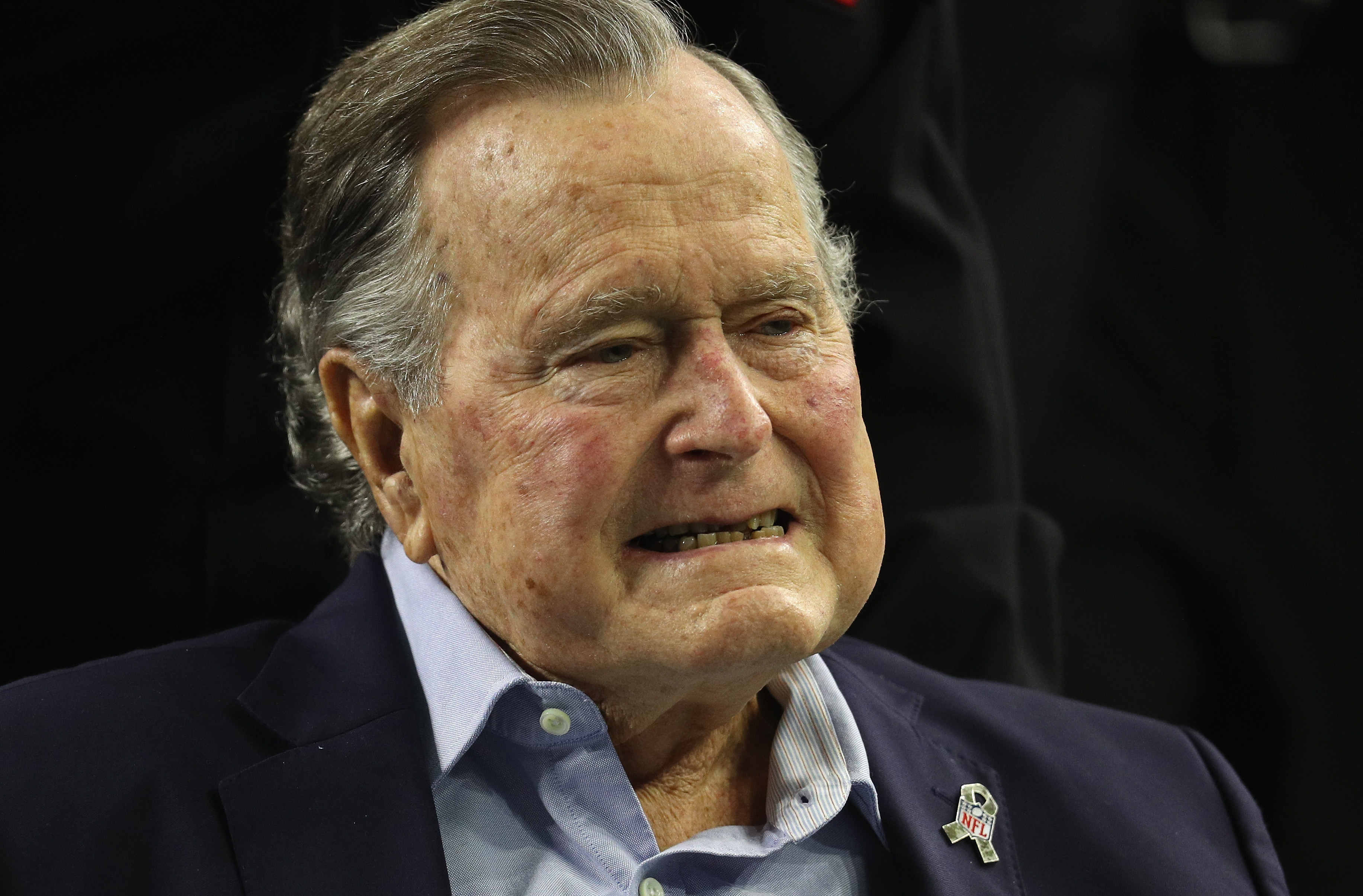 HOUSTON, TX - FEBRUARY 05: President George H.W. Bush arrives for the coin toss prior to Super Bowl 51 between the Atlanta Falcons and the New England Patriots at NRG Stadium on February 5, 2017 in Houston, Texas.  (Photo by Patrick Smith/Getty Images)