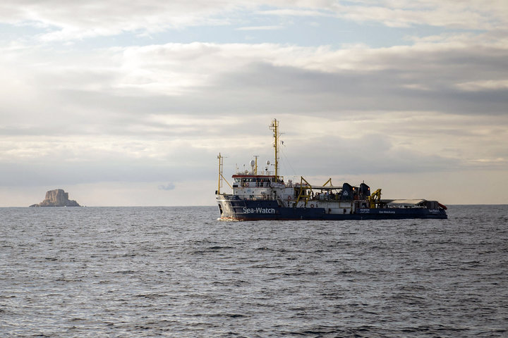 FILE - In this Tuesday, Jan. 8, 2018 filer, the Sea-Watch rescue ship waits off the coast of Malta. A migration official says survivors have told rescuers that up to 117 migrants might have died when a rubber dinghy capsized in the Mediterranean Sea off Libya. Flavio Di Giacomo of International Organization for Migration says three survivors were plucked to safety by an Italian navy helicopter Friday, Jan. 18, 2019 and they say 120 were aboard when the dinghy left Libya. (AP Photo/Rene Rossignaud, File)
