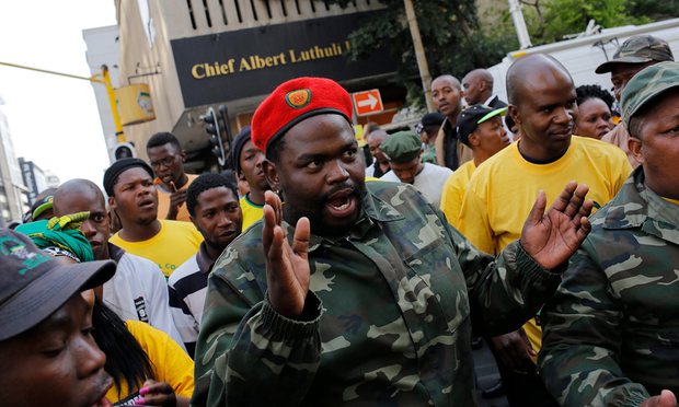 Members of the African National Congress youth league protect the party head offices against a march by party members. Photograph: Kim Ludbrook/EPA