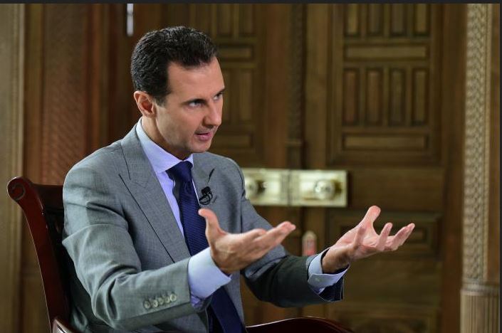 Syria's President Bashar al-Assad speaks during an interview with Russian tabloid Komsomolskaya Pravda, in this handout picture provided by SANA on October 14, 2016. SANA/Handout via REUTERS