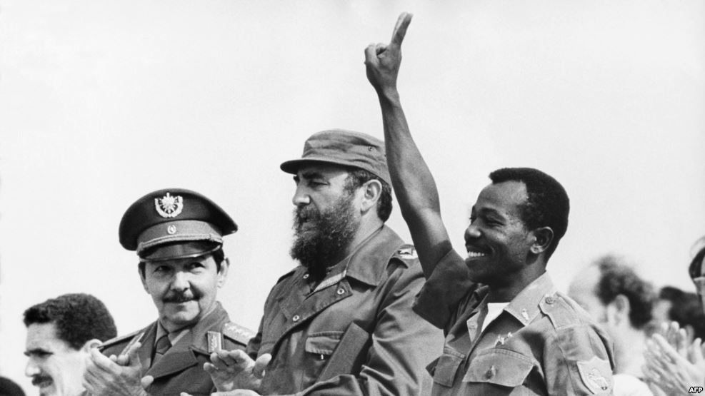 FILE - Ethiopian President Lieutenant Colonel Mengistu Haile Mariam (R) makes V sign as he stands with Fidel Castro (C) and Raul Castro (L) during an official visit in La Havana, Cuba, Apr. 25, 1975. Mengistu took part in the attempted coup against Haile Selassie in 1960 and in 1977 after a further coup he became undisputed ruler of his country. He was overthrown in 1991 by the Ethiopian People's Democratic Front.