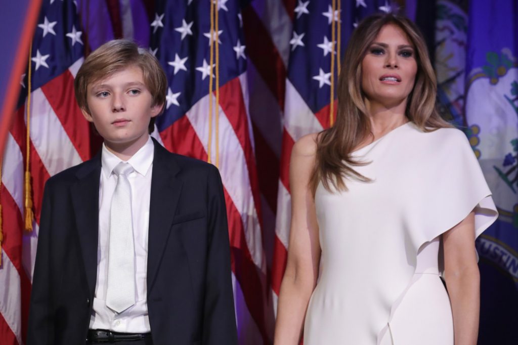 Melanie Trump, right, with her son Barron, who will stay in Manhattan rather than move to the White House, at least until he finishes the school year. (Chip Somodevilla/Getty Images)