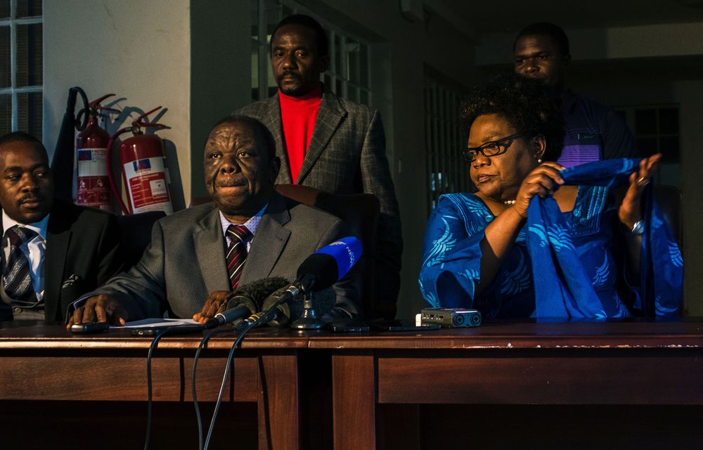 Morgan Tsvangirai and Joice Mujuru sign a Memorandum of Understanding to negotiate a coalition ahead of the 2018 general election in Harare on April 19 2017. Photographer: Jekesai Njikizana/AFP/Getty Images