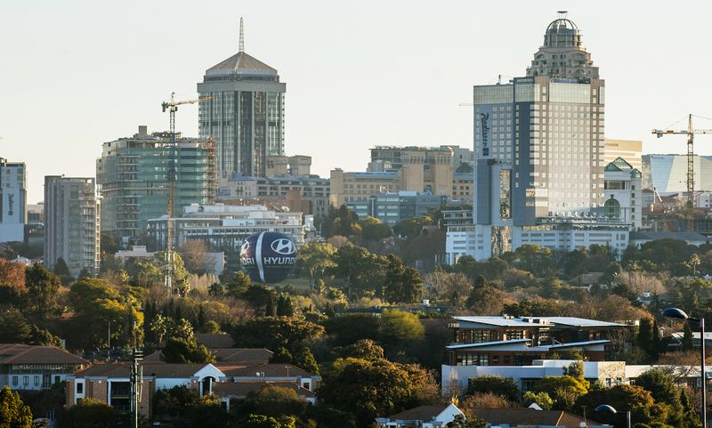 Buildings stand in the Central Business District on the city skyline of Johannesburg, South Africa. Photographer: Waldo Swiegers/Bloomberg