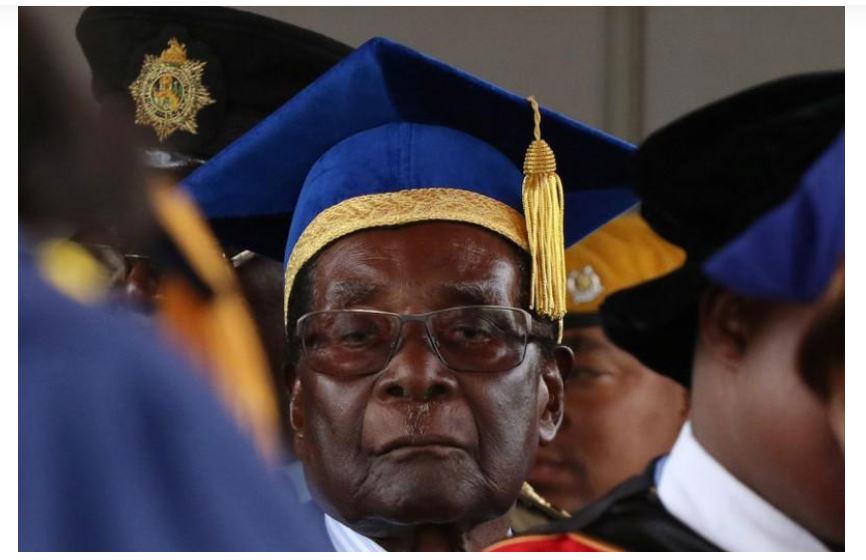Zimbabwe President Robert Mugabe attends a university graduation ceremony in Harare, Zimbabwe, November 17, 2017. REUTERS/Philimon Bulawayo