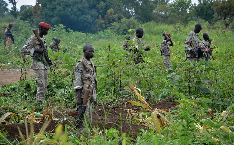 South Sudanese SPLA soldiers are pictured in Pageri in Eastern Equatoria. Photographer: Samir Bol/AFP via Getty Images