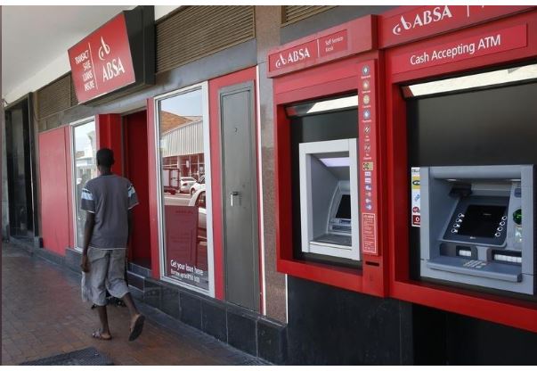 A man walks past a branch of South Africa's retail bank, Absa, in Cape Town, file. EUTERS/Mike Hutchings