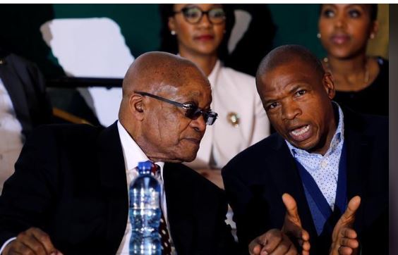 South Africa's former president Jacob Zuma chats with Premier of North West Province Supra Mahumapelo before addressing the National Youth Day commemoration, under the theme "The Year of OR Tambo: Advancing Youth Economic Empowerment", in Ventersdorp, South Africa June 16, 2017. REUTERS/Siphiwe Sibeko