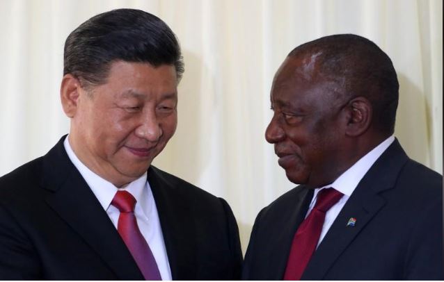 China's President Xi Jinping talks with South African President Cyril Ramaphosa after their media conference in Pretoria, South Africa, July 24, 2018. REUTERS/Mike Hutchings